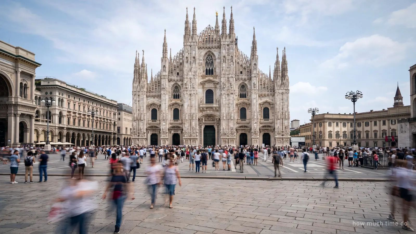 A long exposure of the Duomo square in Milan, visitors blurred into streaks while the facade stays sharp